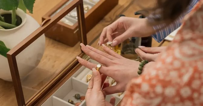 Customer trying on jewelry
