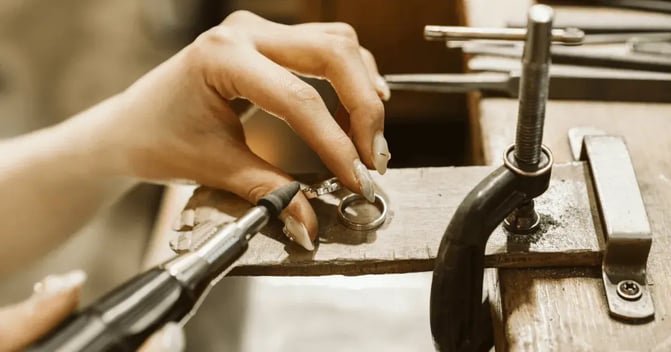 jewelry artisans in a workshop
