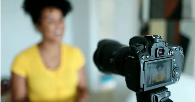 Woman filming a video