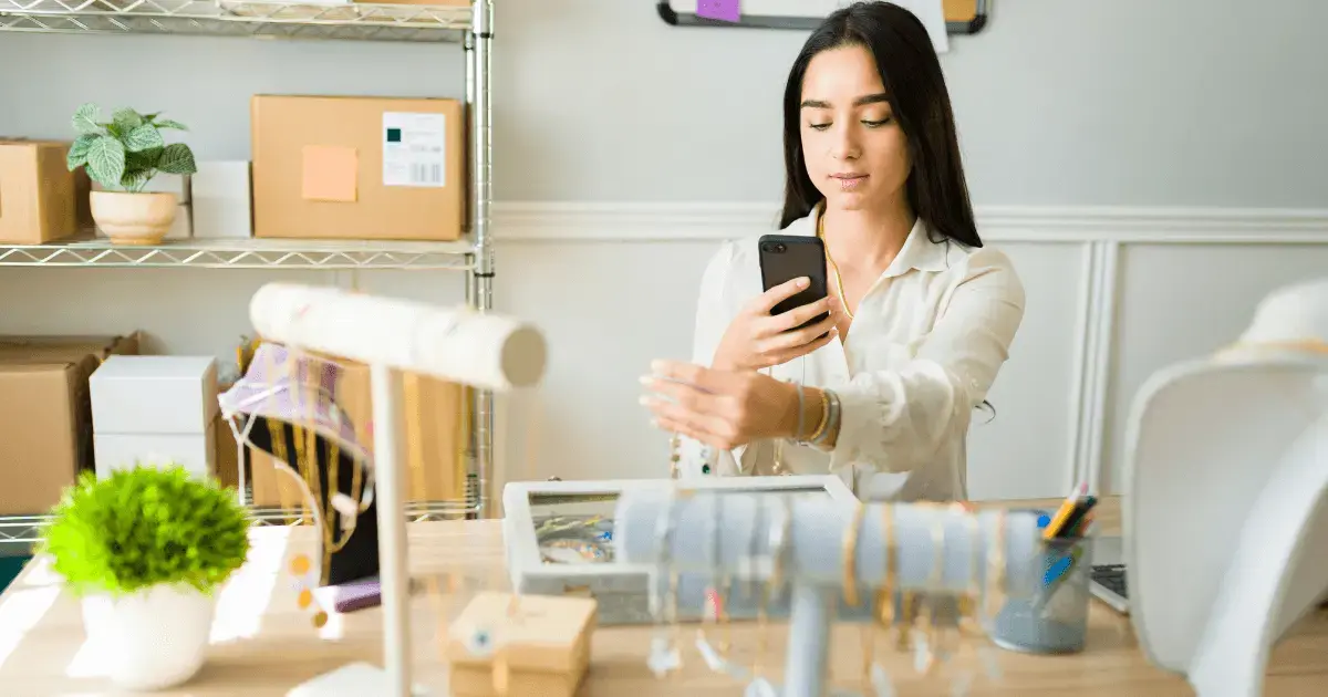 Woman taking pictures of jewelry