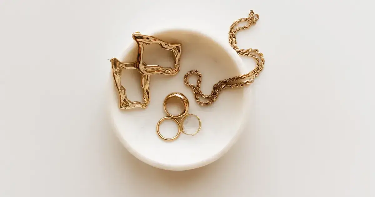 gold jewelry in a bowl